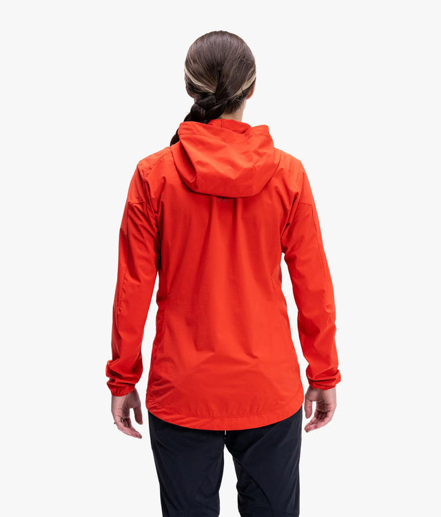 Back on-model view of women's orange 7mesh Northwoods jacket