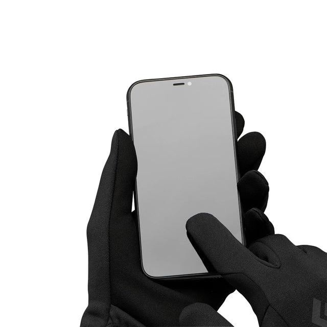 Lifestyle view of Black Diamond Midweight Screentap Liners in black colour