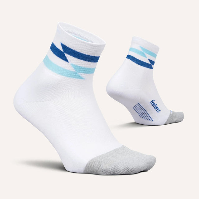 Side and bottom view of Feetures Elite LC quarter sock in white track colour