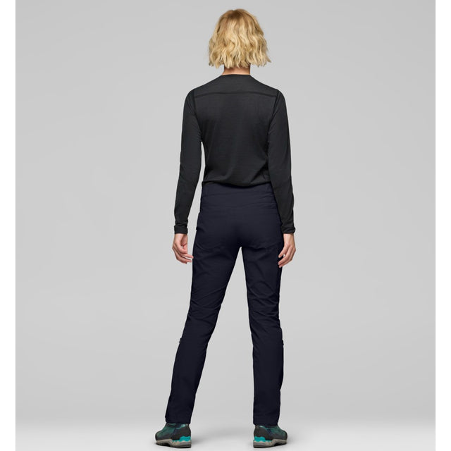 Back on-model view of Norrona femund Flex1 lightweight pants women's in caviar black colour
