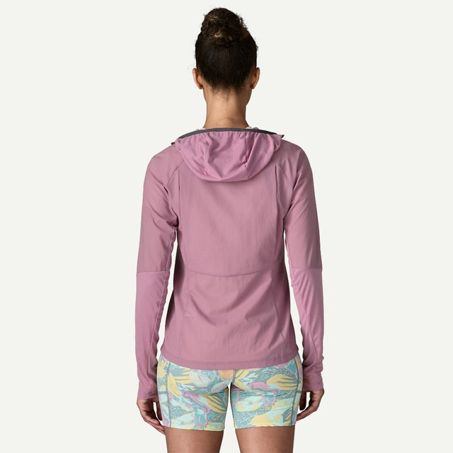 Back view on-model of Patagonia's women's Airshed Pro Pullover in light violet colour