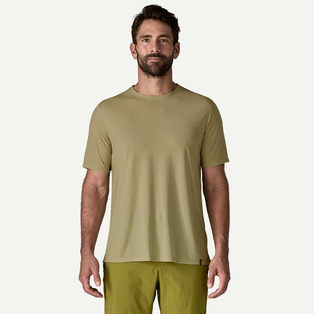 Front view on-model of Patagonia's men's Capilene cool trail shirt in weathered stone