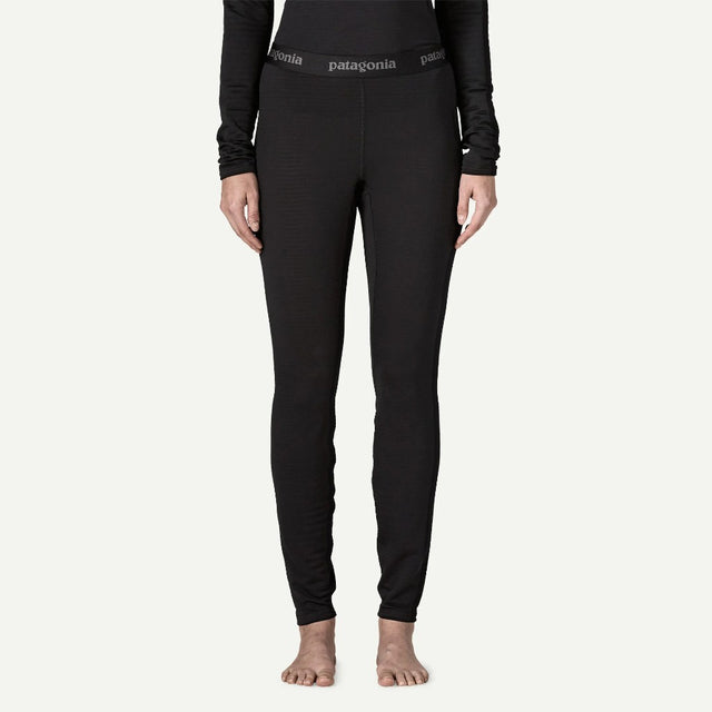 Front on-model view of Patagonia's capilene thermal weight bottoms women's in black colour