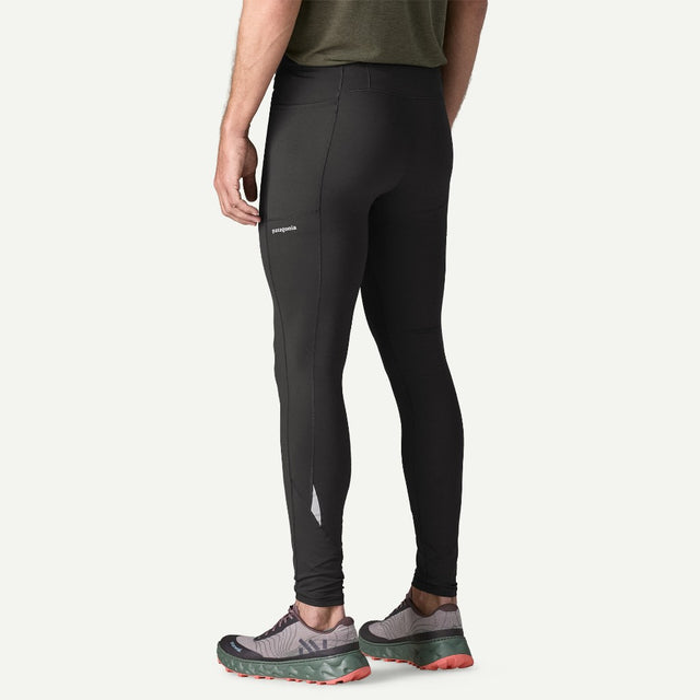 Back on-model view of Patagonia's Men's Peak Mission Tights 28" in black colour