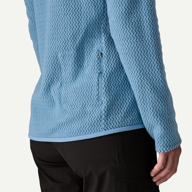 Zipper detail on-model view of Patagonia R1 Air Zip-Neck Women's in Shore Blue colour