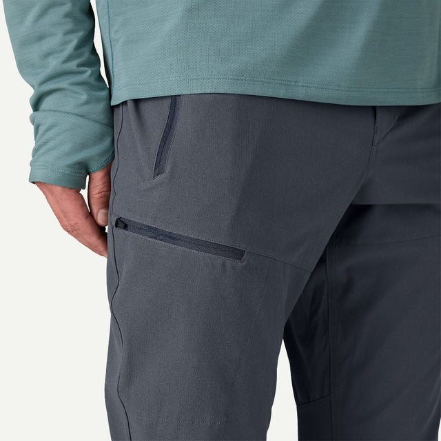 Front zipper detail view of Patagonia Terravia Trail Pants men's in smolder blue colour