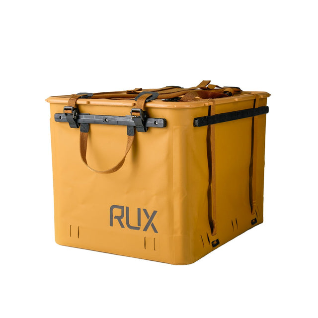 Gold gear box/bag with 'RUX' branding on a white background