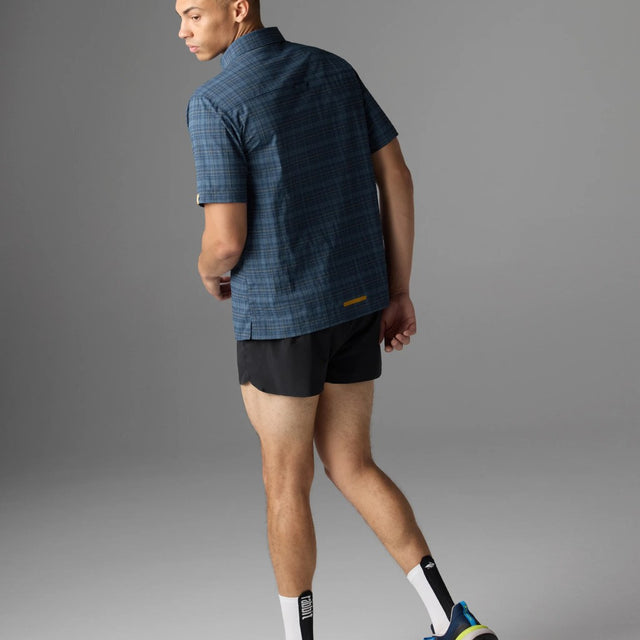 Back on-model view of rabbit High Country SS Men's shirt in dress blue plaid colour