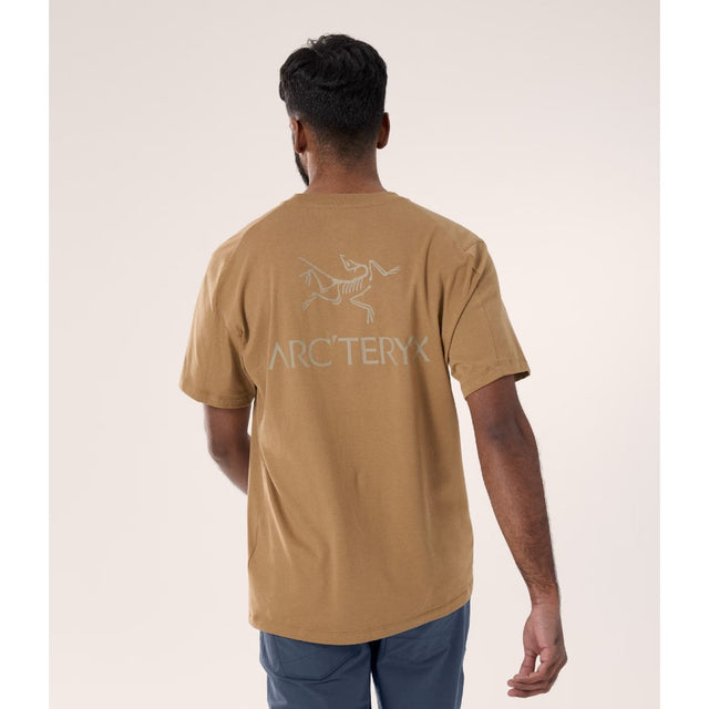Back on-model view of men's Arc'teryx Kragg SL cotton climbing shirt in canvas colour