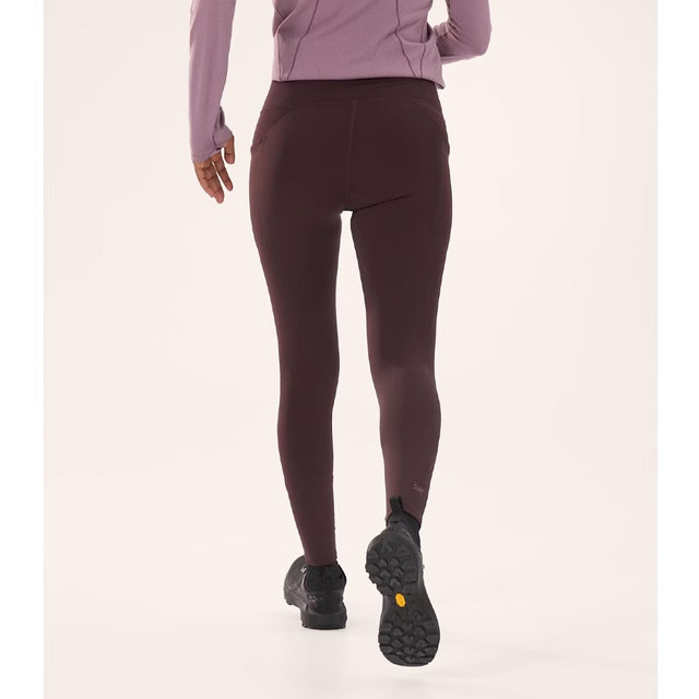 Back on-model view of women's Arc'teryx Essent Warm High Rise 26" legging in Phantasm colour