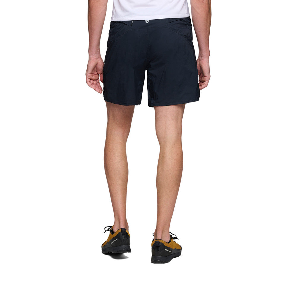 Back on-model view of men's Black Diamond Distance Shorts in black
