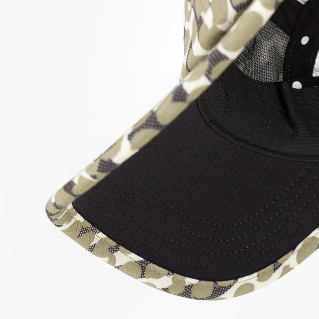 Underbill view of ciele GOCap All Over Dotra running cap in 'Canvas' colour