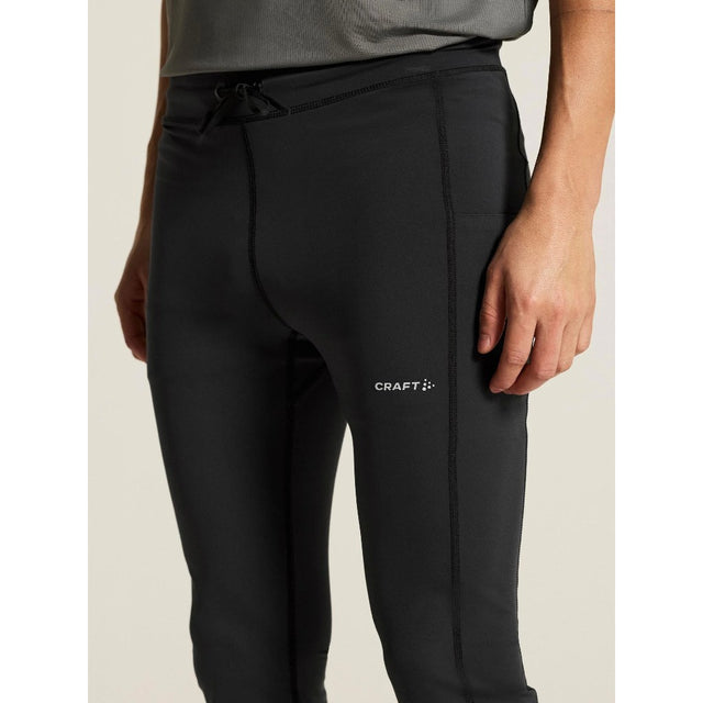 Front on-model closeup view of men's black Craft Hypervent running tights