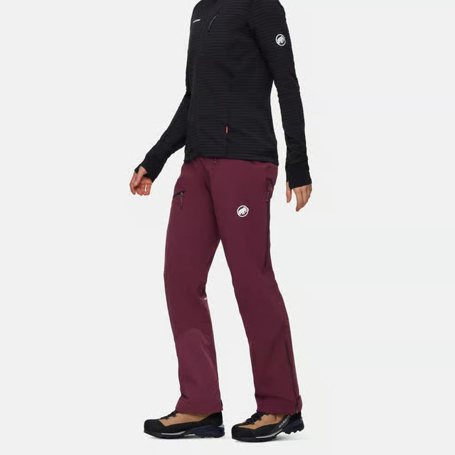 Side on-model view of women's maroon Mammut Taiss Guide SO pants