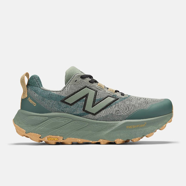 Side view of men's New Balance Hierro v9 trail running shoe in dark juniper/apricot colour
