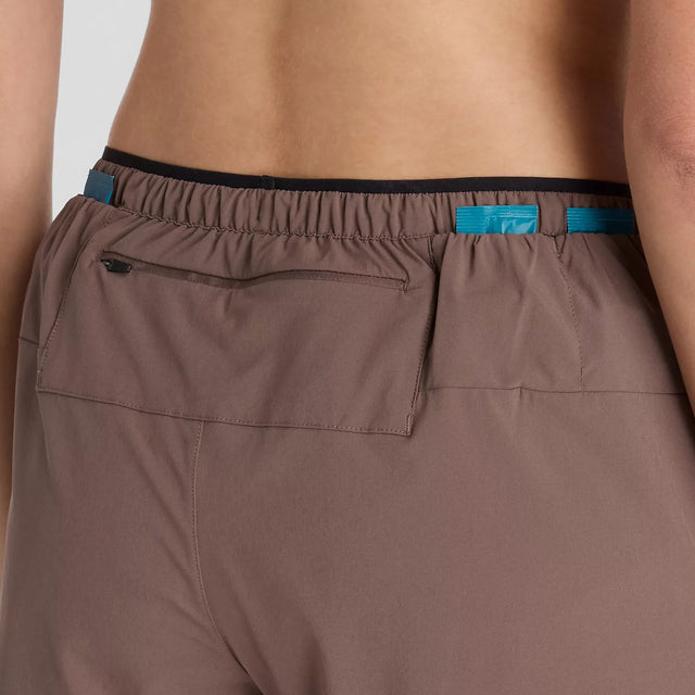 Pocket detail of women's brown New Balance RC Essential shorts