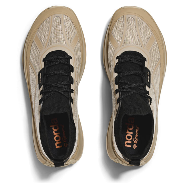 Top view of beige/black norda 055 trail running shoes