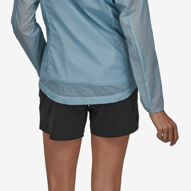 Back on-model view of women's black patagonia multi trails shorts