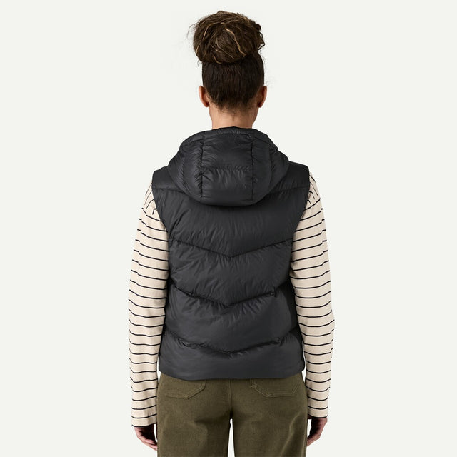 Back on-model view of women's black Patagonia Sindit down vest