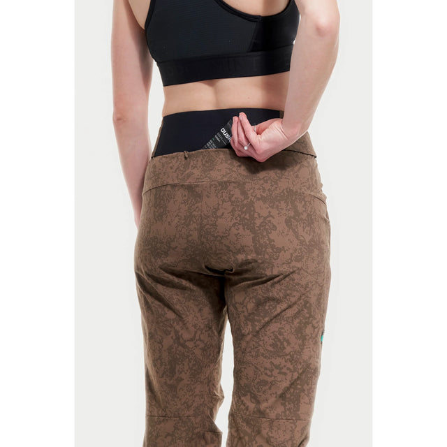 Back pocket detail view of women's brown Peppermint Cycling pants