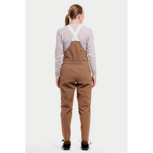 Back on-model view of women's brown Peppermint Cycling overalls
