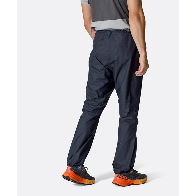 Back on-model view of black Rab Phantom waterproof pants
