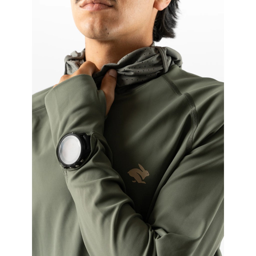 Watch window detail of men's green Rabbit running cocoon 2.0 long sleeve hoody