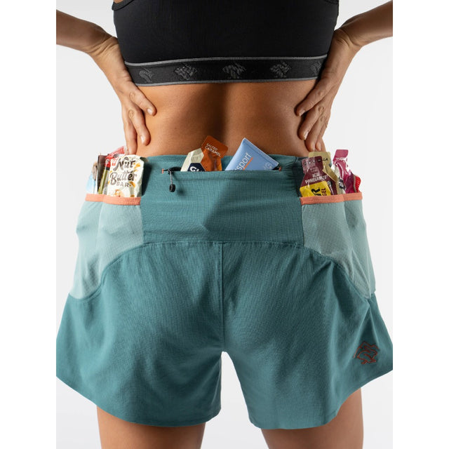 Pocket details of rabbit running FKT 4" shorts in Hydro colour