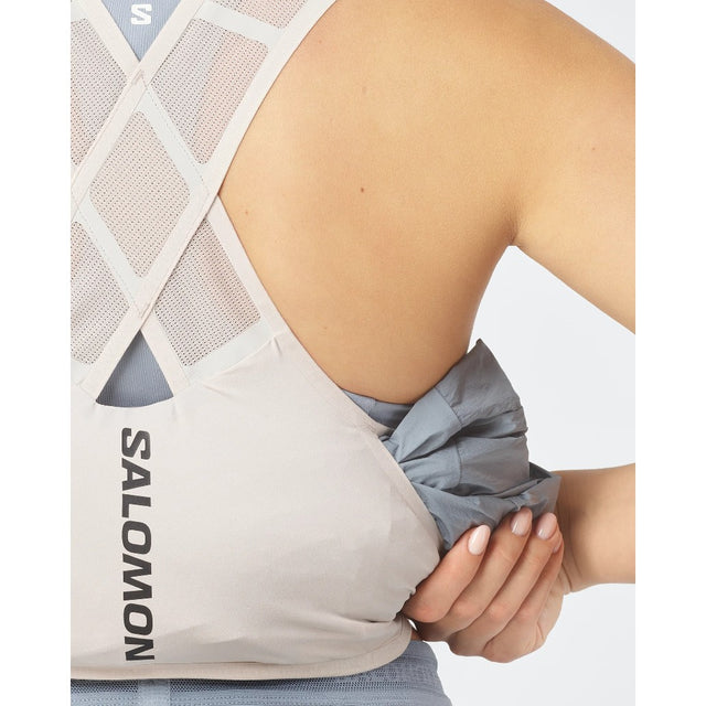 Pulling a jacket out of an off-white Salomon Gravel 2 running vest