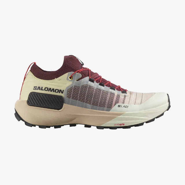 Side view of salomon s/lab genesis trail running shoe in vanilla/chocolate/black colour