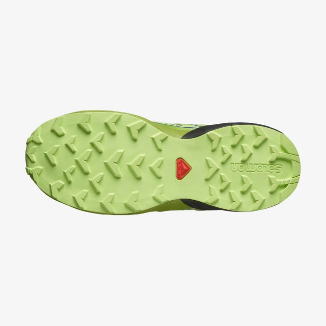 Sole of Salomon Speedcross Junior shoe in green/yellow