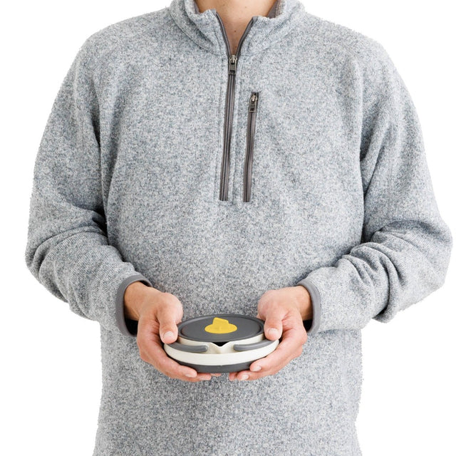 Model holding the sea to summit ultralight frontier collapsible kettle