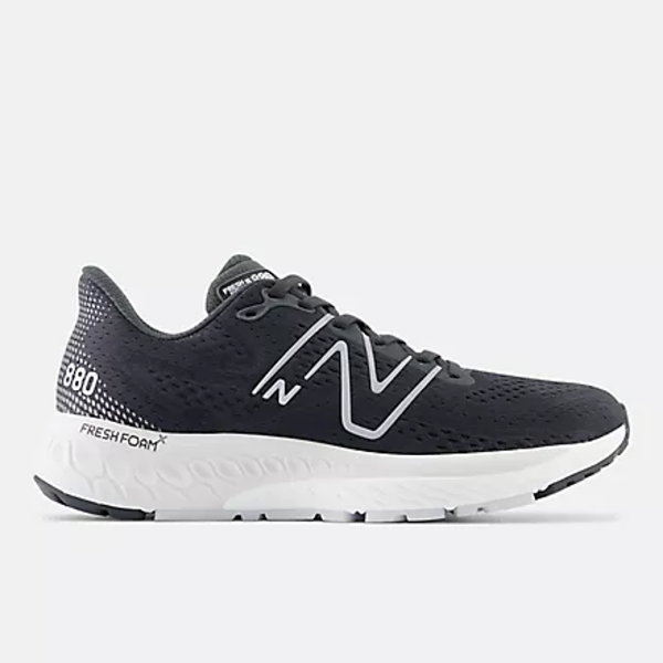 Side view of women's New Balance Fresh Foam X running shoe in phantom black