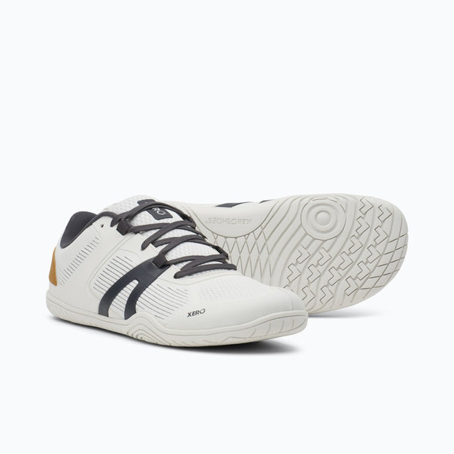 Pair of women's white Xero Shoes 360 Rally court shoes