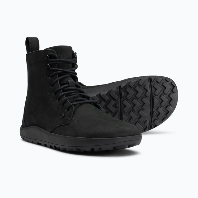 Pair of women's black Xero Shoes Breckenridge lace-up boots