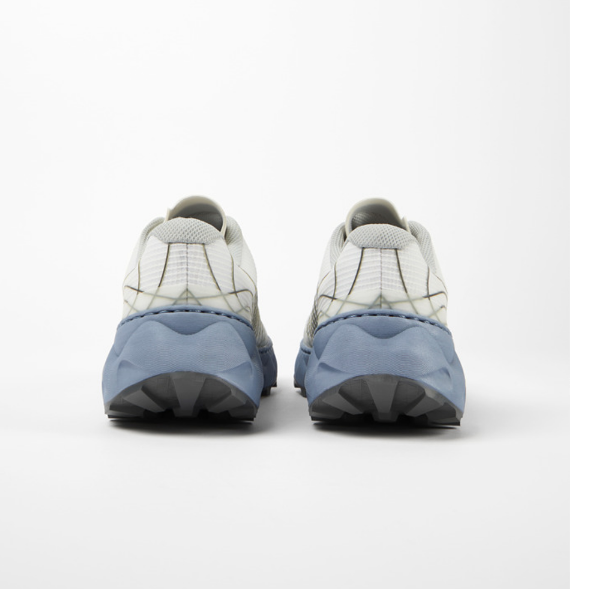 Back of nnormal tomir 1.0 running shoes in white/blue