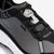 Lace detail of women's norda 001 trail running shoe in black/black rubber