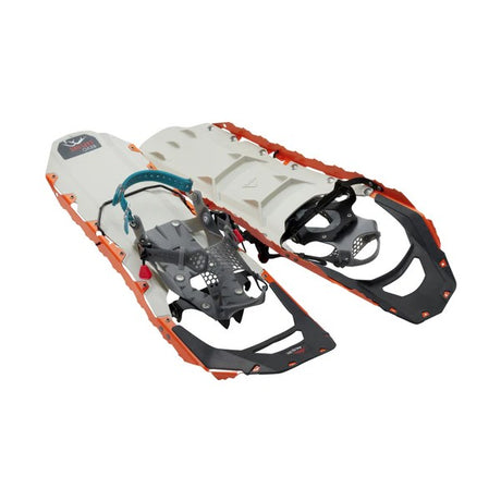 Pair of orange/white MSR Revo Explore snowshoes