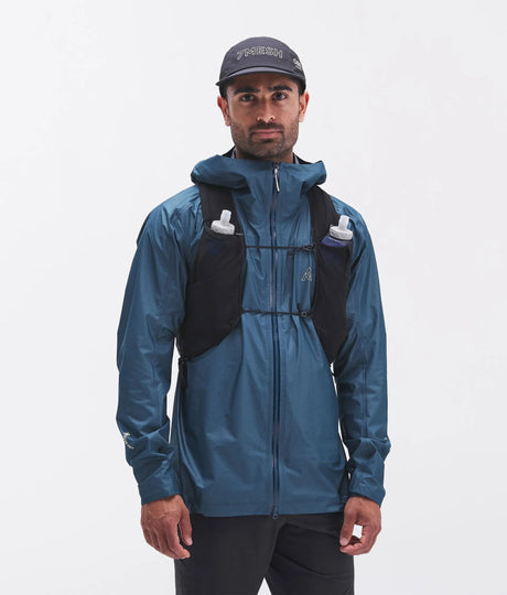 Front view of runner wearing men's blue 7mesh Guardian Air jacket
