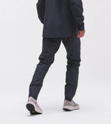 Back on-model view of men's 7mesh Guardian Apex rain pants