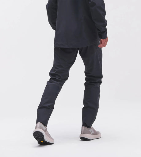 Back on-model view of men's 7mesh Guardian Apex rain pants