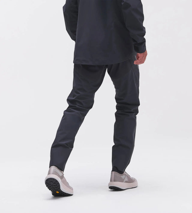Back on-model view of men's 7mesh Guardian Apex rain pants