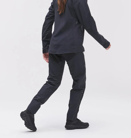 Back on-model view of women's 7mesh Guardian Apex rain pants