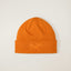 Arcteryx fleece lined toque with embroidered bird logo in copper sky/black colour