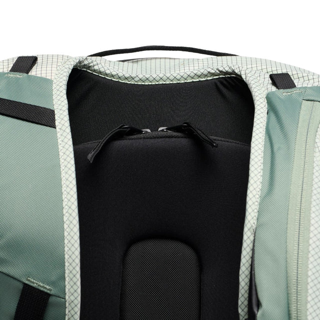 Back pocket view of Black Diamond Dawn patrol 32 backpack in Foam Green colour