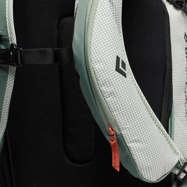 Strap pocket view of Black Diamond Dawn patrol 32 backpack in Foam Green colour