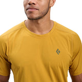 Front detail on-model view of men's Black Diamond Distance SS Tech Tee in amber colour