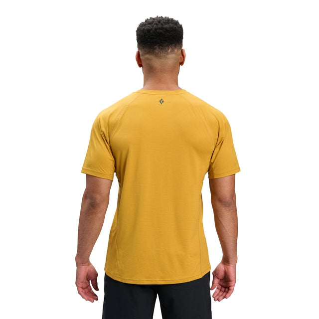 Back on-model view of men's Black Diamond Distance SS Tech Tee in amber colour
