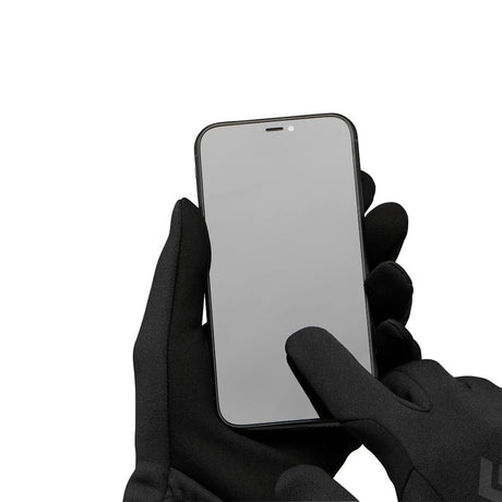 Lifestyle view of Black Diamond Midweight Screentap Liners in black colour