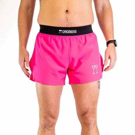 Front on-model view of men's neon pink Chicknlegs split shorts